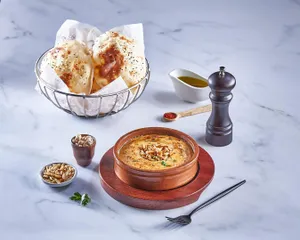 Hummus with pine nuts